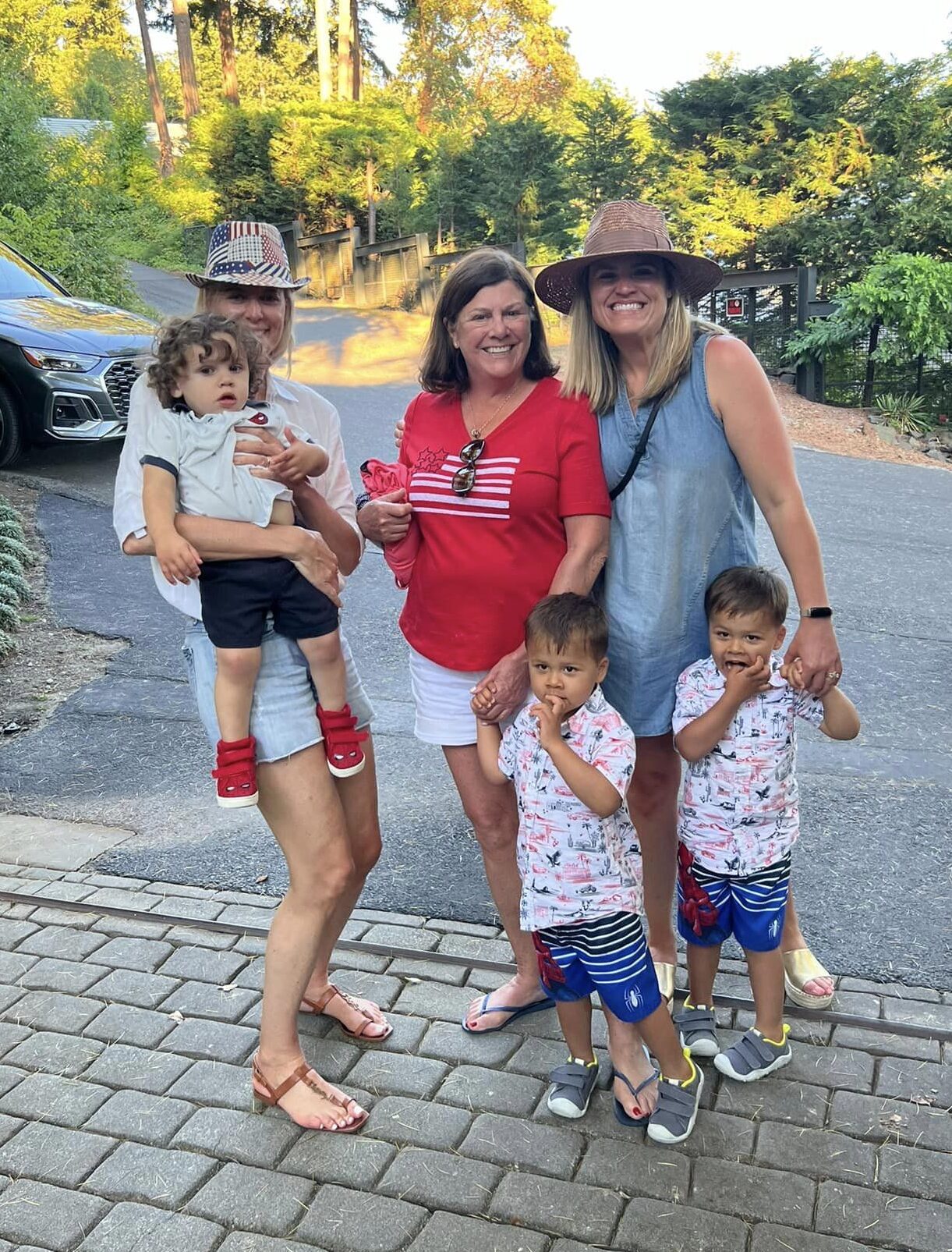 Tamika Felder and Ginny Marable’s families together, including Cousin Susan with Chayton, Ginny’s mom Janet (a.k.a. Mimi), Ginny, and her sons Grant and Emmett. This photo captures the warmth and connection formed through their shared fertility journeys.